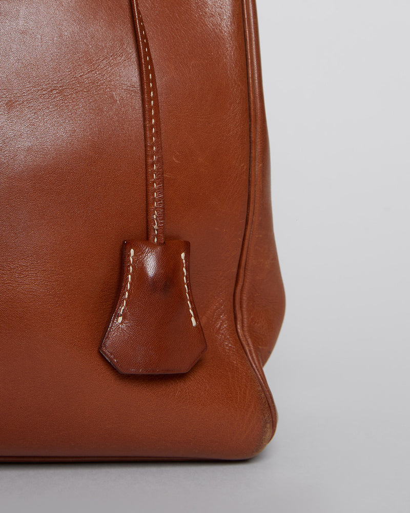 VINTAGE HERMÈS KELLY ADO BACKPACK in saddle brown leather – THE